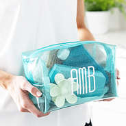 mint clear glitter cosmetic case in hands
