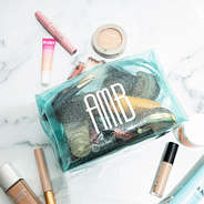 mint clear glitter cosmetic case with makeup