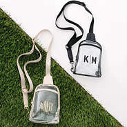 bone and black monogrammed clear sling bag