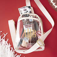 bone personalized sling bag on burgundy background