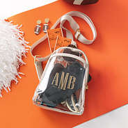 bone personalized sling bag on orange background