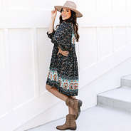 side of black paisley puff sleeve dress