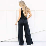 back of black wide leg pants