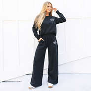 monogrammed black wide leg pants with sweatshirt