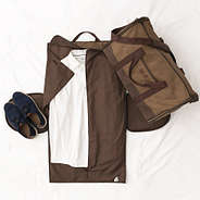 waxed canvas convertible weekend bag flatlay with clothes and shoes