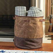 waxed canvas storage basket with blankets