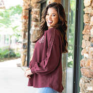 burgundy accent sleeve sweatshirt on peyton
