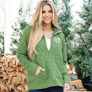 girl wearing monogrammed sage quilted full zip hoodie