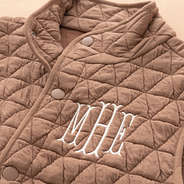 almond vest up close