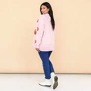 pink pumpkins sequin fall sweatshirt on julia ann back view