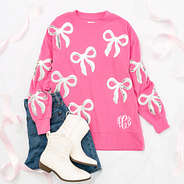 hot pink sequin bow sweatshirt flatlay