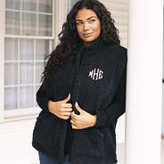 black oversized sherpa vest on julia up close