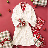 ivory monogrammed plush robe with presents and slippers
