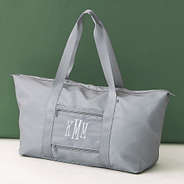 mushroom gray monogrammed carry on weekend bag on olive background