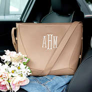 monogrammed bucket bag in car