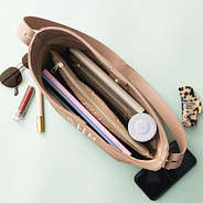 inside of taupe bucket bag