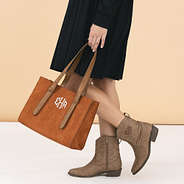 personalized suede purse in hands octagonal