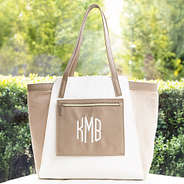 taupe colorblock tote bag on bench