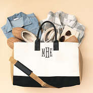 monogrammed ivory upscale weekender packed