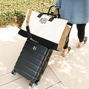 monogrammed upscale ivory weekender with trolley luggage strap