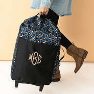 sapphire leopard rolling duffel bag holding top strap