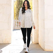 girl wearing monogrammed softspun pullover in snow leopard