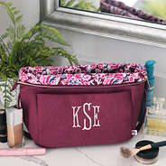 Burgundy Woodland Blossom foldover cosmetic case open on counter