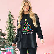 girl wearing merry and bright black christmas sweatshirt up close
