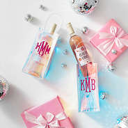 2 wine gift bags with wine flatlay