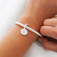 Shiny silver bracelet on wrist