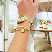 gold engraved cable bracelet on wrist