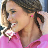 heart stud earrings on ear