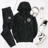 black monogrammed knit sweater jacket with sneakers