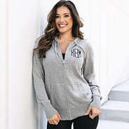 girl wearing monogrammed gray knit sweater jacket