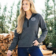 girl wearing monogrammed fleece quarter zip hoodie in charcoal