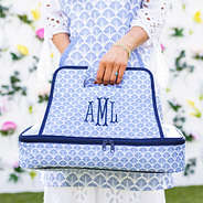 blue shells casserole carrier in hand