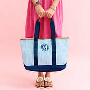 navy blue seersucker tote bag in hands