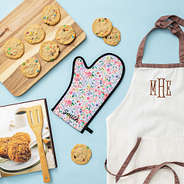 coral floral neoprene oven mitt flatlay