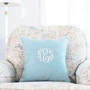 light blue linen pillow case on chair