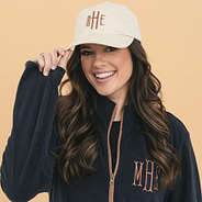 girl wearing stone vintage wash monogrammed baseball hat