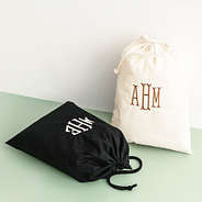 duo drawstring travel bag in natural and black