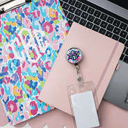 watercolor cheetah badge reel and clipboard