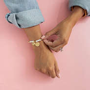 pearl  heart  bracelet  on  girls  wrist