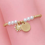 pearl  heart  bracelet  on  pink