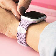 lavender monogrammed smart watch band on wrist