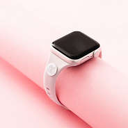 taupe watch band on pink background