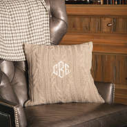 tan cable knit pillow sham on chair