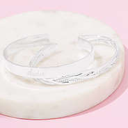 monogrammed bangle set on marble