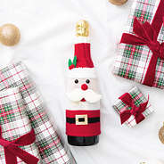 santa wine bottle sweater flatlay