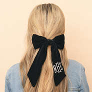 black velvet monogrammed bow in hair